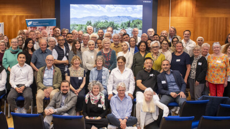 Group photo with dozens of persons.